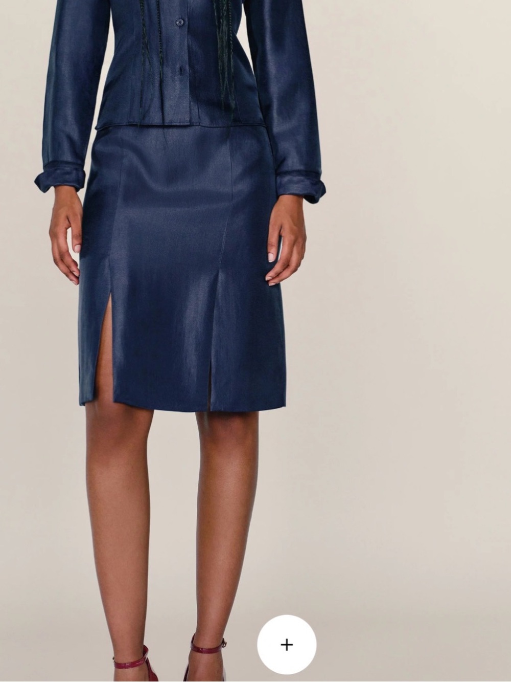 Reformation Navy Satin skirt with front slits.